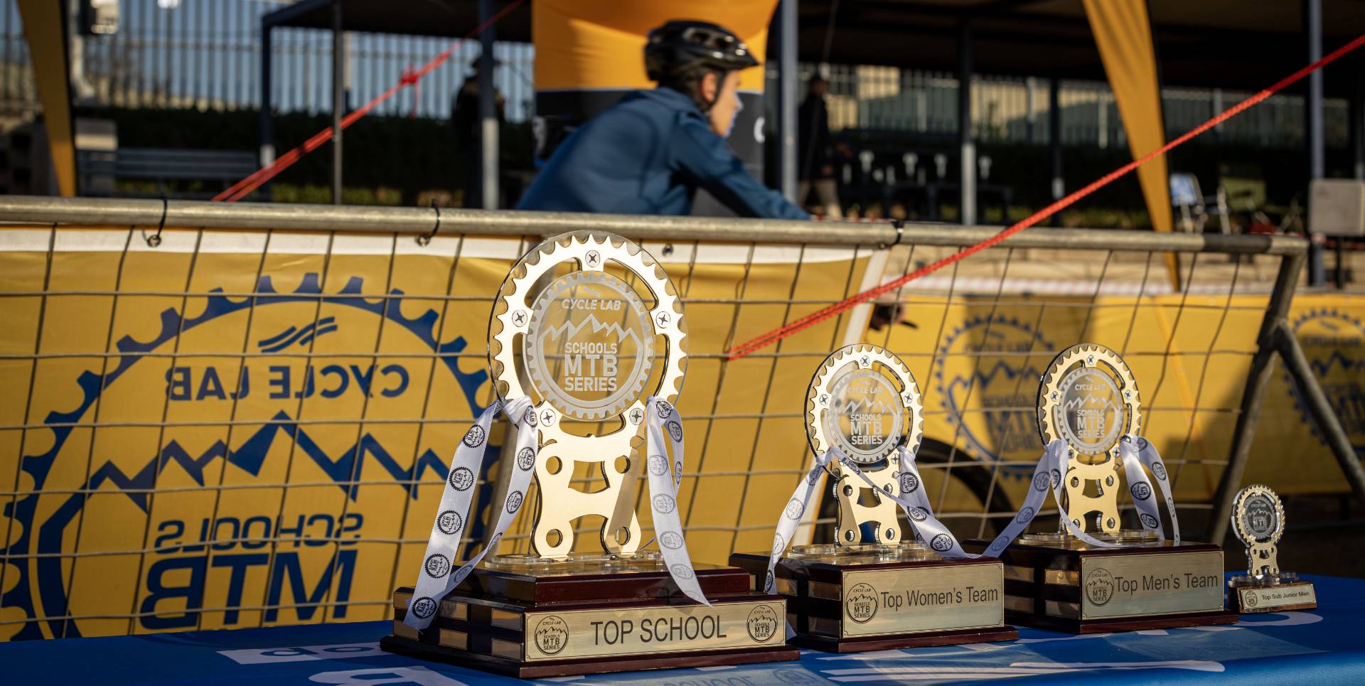 The series trophies for the top school and the top teams